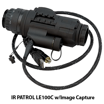 Trijicon IR-Patrol LE100C thermal monocular shown sitting on top of the included USB cable.