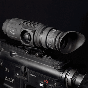 AR-15 rifle with a Trijicon IR-Patrol thermal monocular mounted to it.