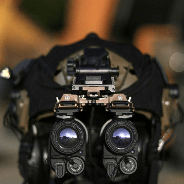 InfiRay Outdoor MINI MH25W shown mounted to a black bump helmet.