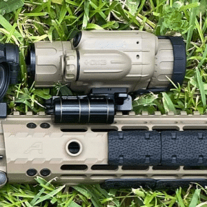 Pixels on Target VooDoo-S thermal weapon sight shown mounted to the rail of an AR-15 rifle.